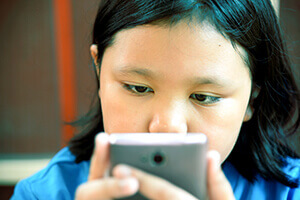 Child using a mobile device